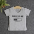 VNF7007 - Áo thun trẻ em cổ tim tay ngắn in chữ Dad To Be (Hồng cam)